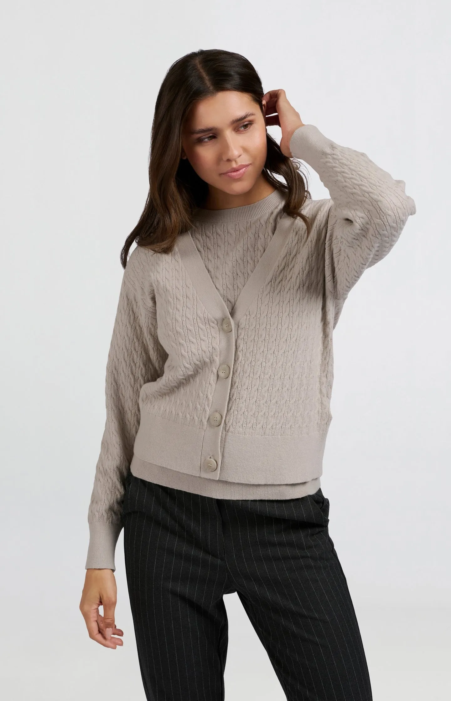 Cardigan with cable pattern, long sleeves and deep V-neck