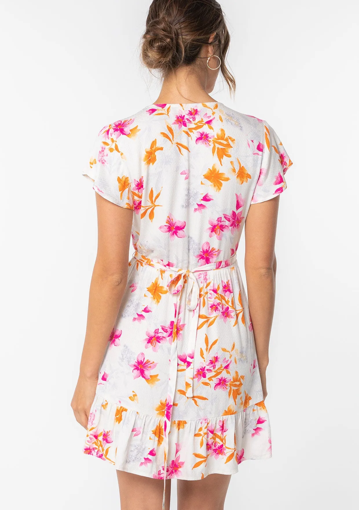 Making Moves Mini Wrap Dress